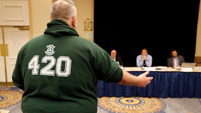 Joseph Baker testifies during a hearing held by Maine Office of Marijuana Policy, Thursday, May 23, 2109, in Portland.