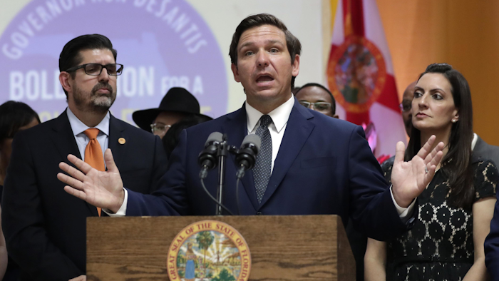 In this May 9, 2019 file photo, Gov. Ron DeSantis speaks during a bill signing ceremony in Miami Gardens, Fla.