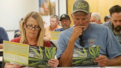 Alfalfa farmers Diane and Russ Jones look on during a public hearing on medical cannabis at the Utah Department of Agriculture and Food, Wednesday, June 5, 2019, in Salt Lake City.