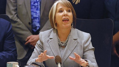 New Mexico Gov. Michelle Lujan Grisham highlights accomplishments by lawmakers at the close of a 60-day legislative session on Saturday, March 16, 2019, at her offices in Santa Fe.