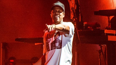 In this Oct. 13, 2017, file photo, Jay-Z performs at the Austin City Limits Music Festival in Austin, Texas. Jay-Z is heading into the marijuana industry as a chief brand strategist for a cannabis product company. He said in a statement Tuesday, July 9, 2019, that he entered a multi-year deal with San Jose, California-based Caliva. His role will consist of driving creative direction, outreach efforts and strategy for the brand.