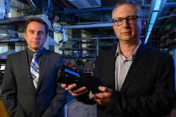 Ervin Sejdic, PhD (left) and Alexander Star, PhD, hold up the prototype of their THC-detecting device.