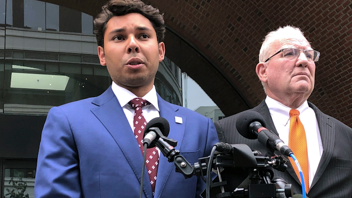 Fall River Mayor Jasiel Correia speaks beside his attorney, Kevin Reddington, outside the federal courthouse in Boston, Friday, Sept. 6, 2019.