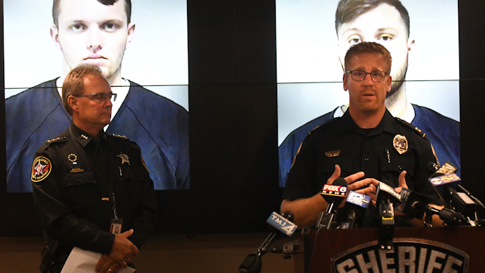 Capt. Dan Baumann of the Waukesha Police Department, right, with Kenosha County Sheriff David Beth during a news conference in Kenosha, Wis., Wednesday, Sept. 11, 2019.