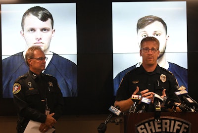 Capt. Dan Baumann of the Waukesha Police Department, right, with Kenosha County Sheriff David Beth during a news conference in Kenosha, Wis., Wednesday, Sept. 11, 2019.
