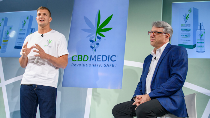 Former New England Patriots tight end Rob Gronkowski, left, and Perry Antelman, CEO of Abacus Health Products, at a news conference in New York, Aug. 27, 2019.