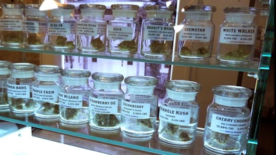 This Nov. 25, 2019, photo shows marijuana on display at Arbors Wellness in the medical marijuana shop in Ann Arbor, Mich.