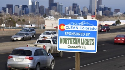 Clean Colorado highway sign, sponsored by the Northern Lights Cannabis Co., on 6th Avenue in Denver, Feb. 6, 2020.