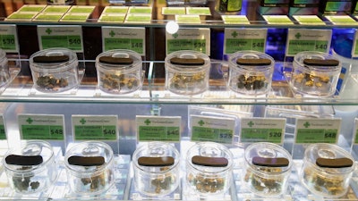 Marijuana buds for sale are displayed at The Green Cross dispensary in San Francisco, March 18, 2020.