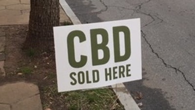 A sign outside a market in Atlanta on Jan. 18, 2019 advertising the availability of CBD.