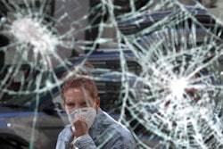 Smashed storefront window in Boston's Downtown Crossing, June 1, 2020.