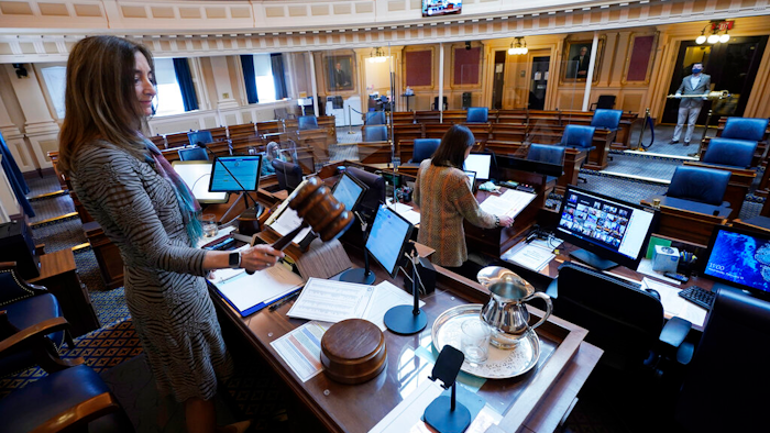 House Speaker Eileen Filler-Corn, D-Fairfax, gavels in the session to an empty Virginia House of Delegates chamber, Richmond, Feb. 10, 2021.