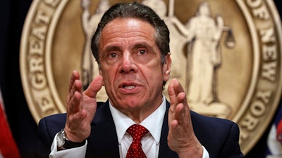 In this March 24, 2021 file photo, New York Gov. Andrew Cuomo speaks during a news conference at his offices in New York. New Yorkers can now possess up to 3 ounces of cannabis under a legalization bill signed by Cuomo. Criminal justice reform advocates hope the legislation signed Wednesday, March 31, will help redress the inequities of a system that has locked up people of color for marijuana offenses at disproportionate rates.