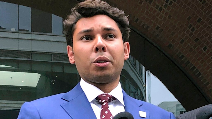 Fall River Mayor Jasiel Correia speaks to reporters outside the federal courthouse in Boston, Sept. 6, 2019.