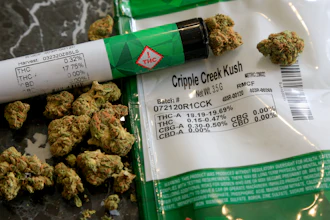 The THC percentages of recreational marijuana visible on the product packaging on a countertop in Mamaroneck, N.Y., April 19, 2021.