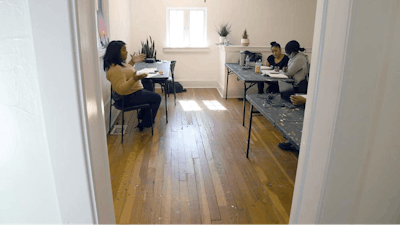 Sarah Woodson, left, teaches a class on social equity in the marijuana industry, Denver, April 3, 2021.