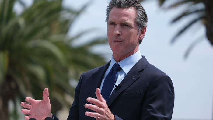 California Gov. Gavin Newsom talks during a news conference at Universal Studios, Universal City, Calif., June 15, 2021.