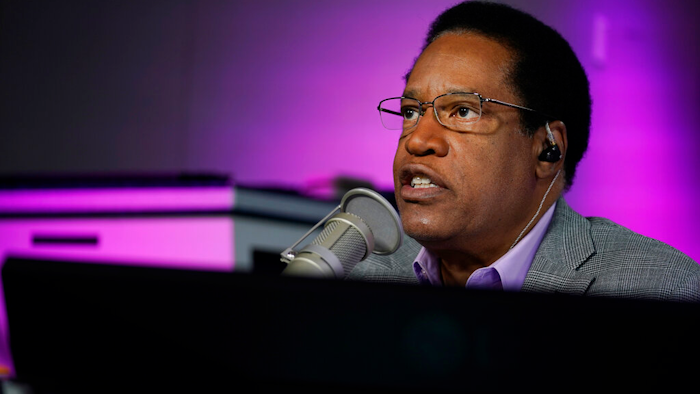 Radio talk show host Larry Elder speaks during his show, Burbank, Calif., July 12, 2021.