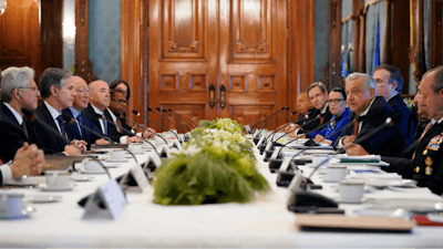 Mexican President Andrés Manuel López Obrador, right, speaks during a working breakfast with Secretary of State Antony Blinken at the National Palace in Mexico City, Friday, Oct. 8, 2021.