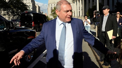 Lev Parnas leaves federal court in New York, Oct. 22, 2021.