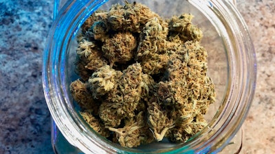 A jar of medical marijuana sits on the counter at a dispensary in Sherwood, Ore., April 8, 2019.