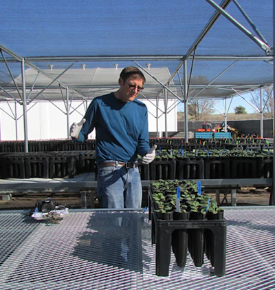 Author Dr. Ted Swiecki explaining testing protocols at an accredited nursery.