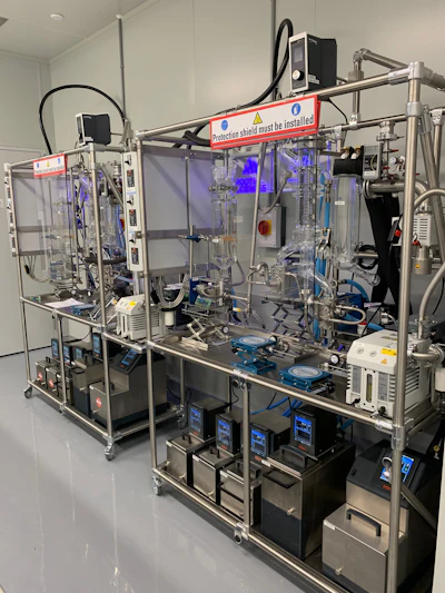 A pair of Root Sciences distillation plants setup for continuous production.