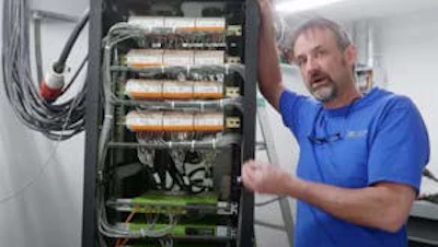 [1] Certified electrician connects DE transmitter cabinet(s) (capable of transmitting up to 81 kW of power) using a single connection to a transformer in the electrical room.