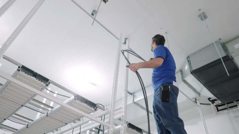 [5] Because DE eliminates nearly all conduit, it installs up to 80% faster than traditional AC power distribution, reducing labor costs and building times by weeks or months.