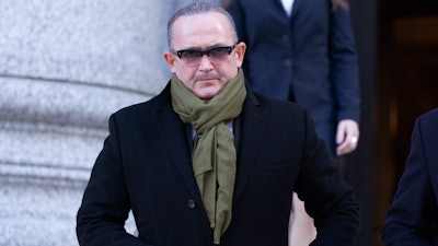 Igor Fruman leaves federal court in Manhattan after being sentenced, Jan. 21, 2022.