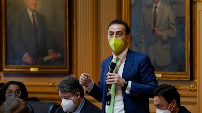 Virginia Del. Marcus Simon, D-Fairfax, gestures during the House session at the Capitol in Richmond, Feb. 15, 2022.