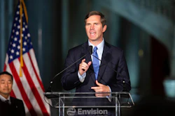 Gov. Andy Beshear, along with Envision Automotive Energy Supply Corporation (AESC) business executives and state and local officials, gather at the State Capitol in Frankfort, Ky., on Wednesday, April 13, 2022. Beshear said Thursday, April 21, he will form an advisory team as part of a broad review as he weighs whether to take executive action to legalize access to medical marijuana.