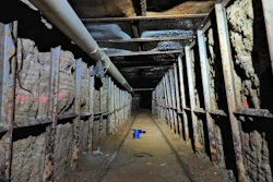This undated photo provided by Homeland Security Investigations shows the inside of a cross border tunnel between Mexico's Tijuana into the San Diego area. Authorities announced on Monday, May 16, 2022, the discovery of the underground smuggling tunnel on Mexico's border, running the length of a football field on U.S. soil to a warehouse in an industrial area. The cross-border tunnel from Tijuana to the San Diego area was built in one of the most fortified stretches of the border, illustrating the limitations of former President Donald Trump's border wall.
