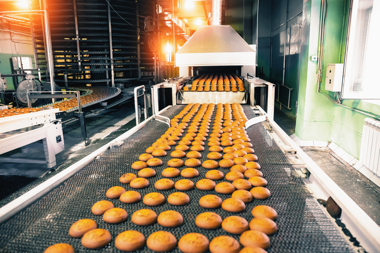 Bakery Production Line With Sweet Cookies On Conveyor Belt In Confectionery Factory Workshop, Food Production Manufacturing 1205125547 1257x838 (1)