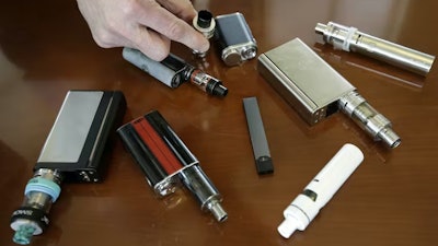 Vaping is popular with high school students – as shown in this photo of vapes confiscated at a New York high school – but it is on the decline.
