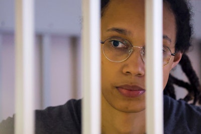 US Basketball player Brittney Griner looks through bars as she listens to the verdict standing in a cage in a courtroom in Khimki, outside Moscow, Russia, Thursday, Aug. 4, 2022. Lawyers for American basketball star Brittney Griner on Monday, Aug. 15, 2022 filed an appeal of her nine-year Russian prison sentence for drugs possession. Griner, a center for the Phoenix Mercury and a two-time Olympic gold medalist, was convicted on Aug. 4. She was arrested in February at Moscow's Sheremetyevo Airport after vape canisters containing cannabis oil were found in her luggage.
