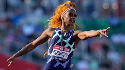 United States sprinter Sha'Carri Richardson celebrates after winning the first heat of the semis finals in women's 100-meter run at the U.S. Olympic Track and Field Trials on June 19, 2021, in Eugene, Ore. Cannabis use will stay banned at sports events after the World Anti-Doping Agency on Friday Sept. 23, 2022 resisted calls to change its status on the list of prohibited substances. The agency was asked to review the status of THC after the case of Richardson, who did not go to the Tokyo Olympics last year. She served a one-month ban on testing positive at the trials meet where she won the 100 meters.
