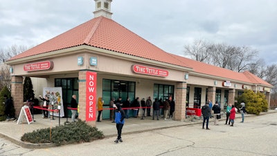 Customers wait in line outside the Fine Fettle marijuana dispensary in Willimantic, Conn., Tuesday, Jan. 10, 2023, for the opening of legal sales of recreational marijuana in Connecticut.