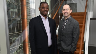 Dr. Lishomwa Ndhlovu and Dr. Michael Corley