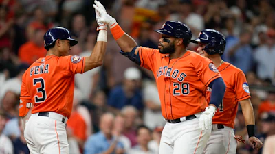 Houston Astros' Jon Singleton (28) celebrates his two-run home run against the Los Angeles Angels with Jeremy Pena (3) during the third inning of a baseball game Friday, Aug. 11, 2023, in Houston.