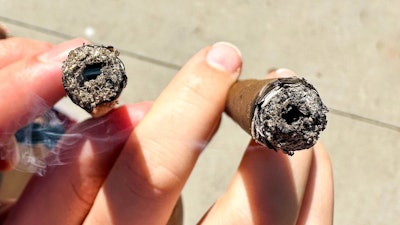 A side-by-side comparison shot of an undisclosed premium hash hole brand (left) and a Jiko+ Donut Maker crafted 2 g donut blunt infused with 400 mg fresh press rosin (right).