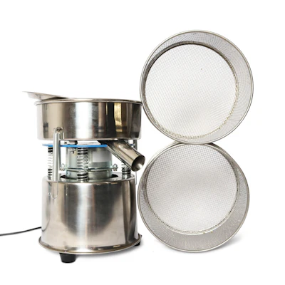 The Quick Sift vibrating flower sifter from Custom Cones USA.