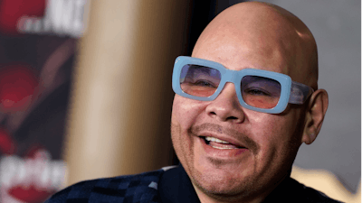 Fat Joe arrives at a premiere, Feb. 13, 2024, in Los Angeles. Vice President Kamala Harris says it's “absurd” that the federal government classifies marijuana as more dangerous than fentanyl, the synthetic opioid blamed for tens of thousands of deaths in the United States.