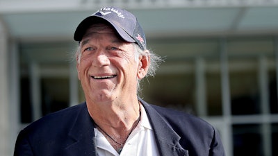 Former Minnesota Gov. Jesse Ventura talks to reporters outside the federal building in St. Paul, Minn., on Oct. 20, 2015.