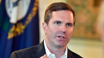 Kentucky Gov. Andy Beshear responds to a question during an interview, Dec. 19, 2023, in Frankfort, Ky. Kentucky will use a lottery system to award an initial round of licenses to businesses competing to participate in the state's startup medical cannabis program, Beshear announced Thursday, April 18, 2024.