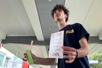 Jayden D'Onofrio passes out Plan B, condoms and rolling papers to educate young voters at Florida Atlantic University on Thursday, April 11 in Boca Raton, Fla. Abortion and marijuana will be on Florida's November ballot, and these issues are critical issues for young voters.