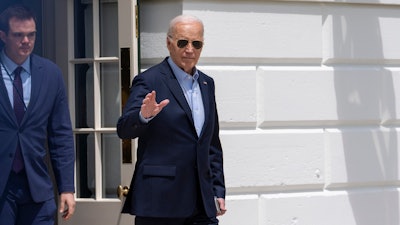 President Joe Biden waves as he walks to Marine One for departure from the South Lawn of the White House, Tuesday, April 30, 2024, in Washington. Biden is headed to Delaware.