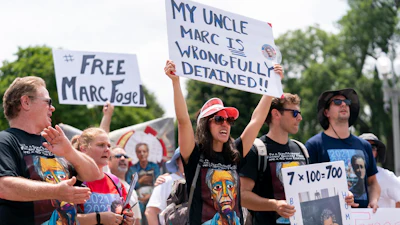 Ellen Keelan, center, and other family members rally outside the White House for the release of Marc Fogel, who has been detained in Russia since August 2021, July 15, 2023, in Washington.