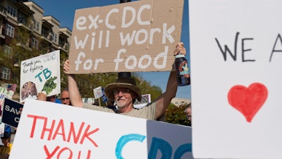 Demonstrators hold a rally in support of the Centers for Disease Control and Prevention in front of the agency's headquarters in Atlanta, Tuesday, April 1, 2025, after layoffs were announced.