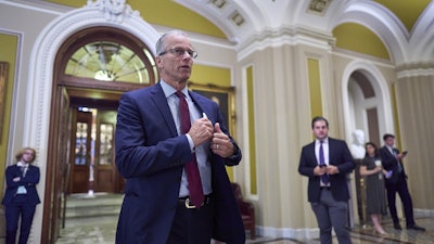 Senate Majority Leader John Thune, R-S.D., leaves the chamber as Republican senators meet to find a way to help President Donald Trump cancel $9.4 billion in spending already approved by Congress, at the Capitol in Washington, Wednesday, June 11, 2025.